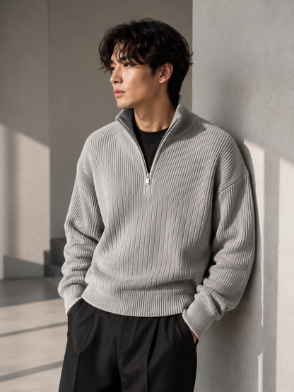 Male model wearing gray half-zip ribbed sweater front view