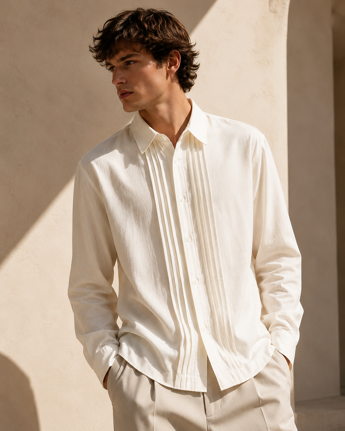 Male model wearing white pleated-placket fashion shirt