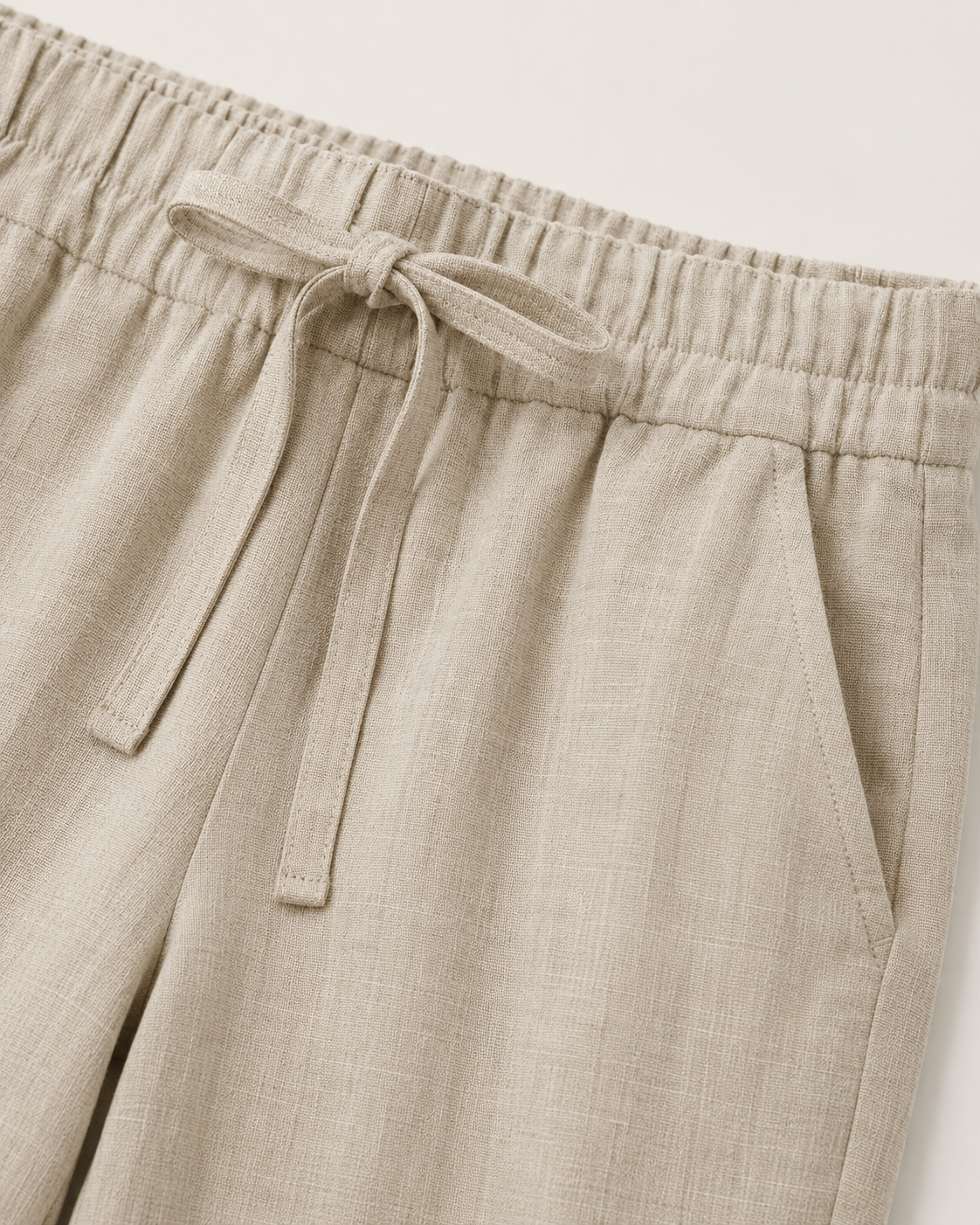 Breathable Wide-Leg Linen Trousers clean close-up waistband fabric detail