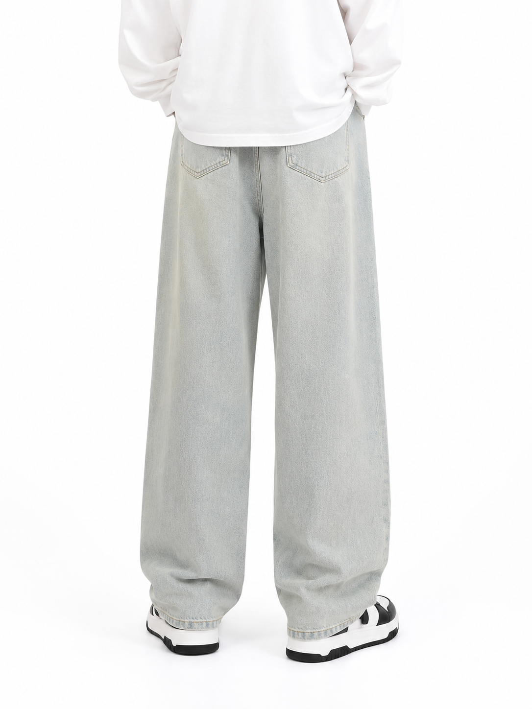 Model wearing light wash Washed Blue Straight-Leg Jeans, back view